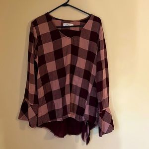 Plaid, rose and maroon blouse with bell sleeves and a bow on bottom in corner!